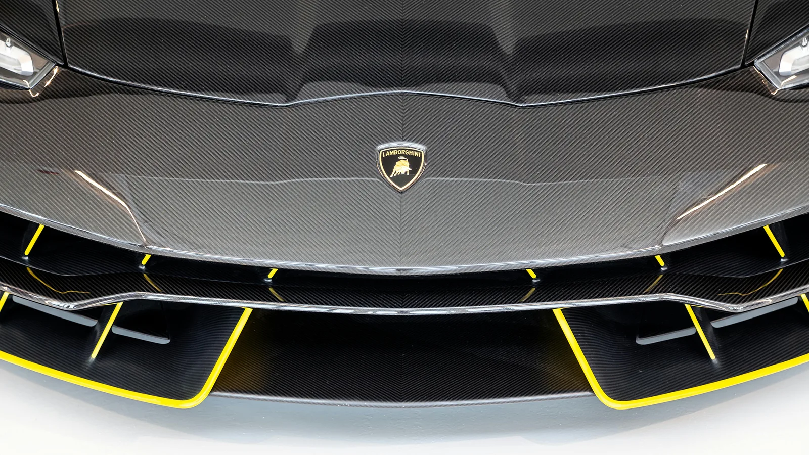 Lamborghini front end masked for carbon fiber repair